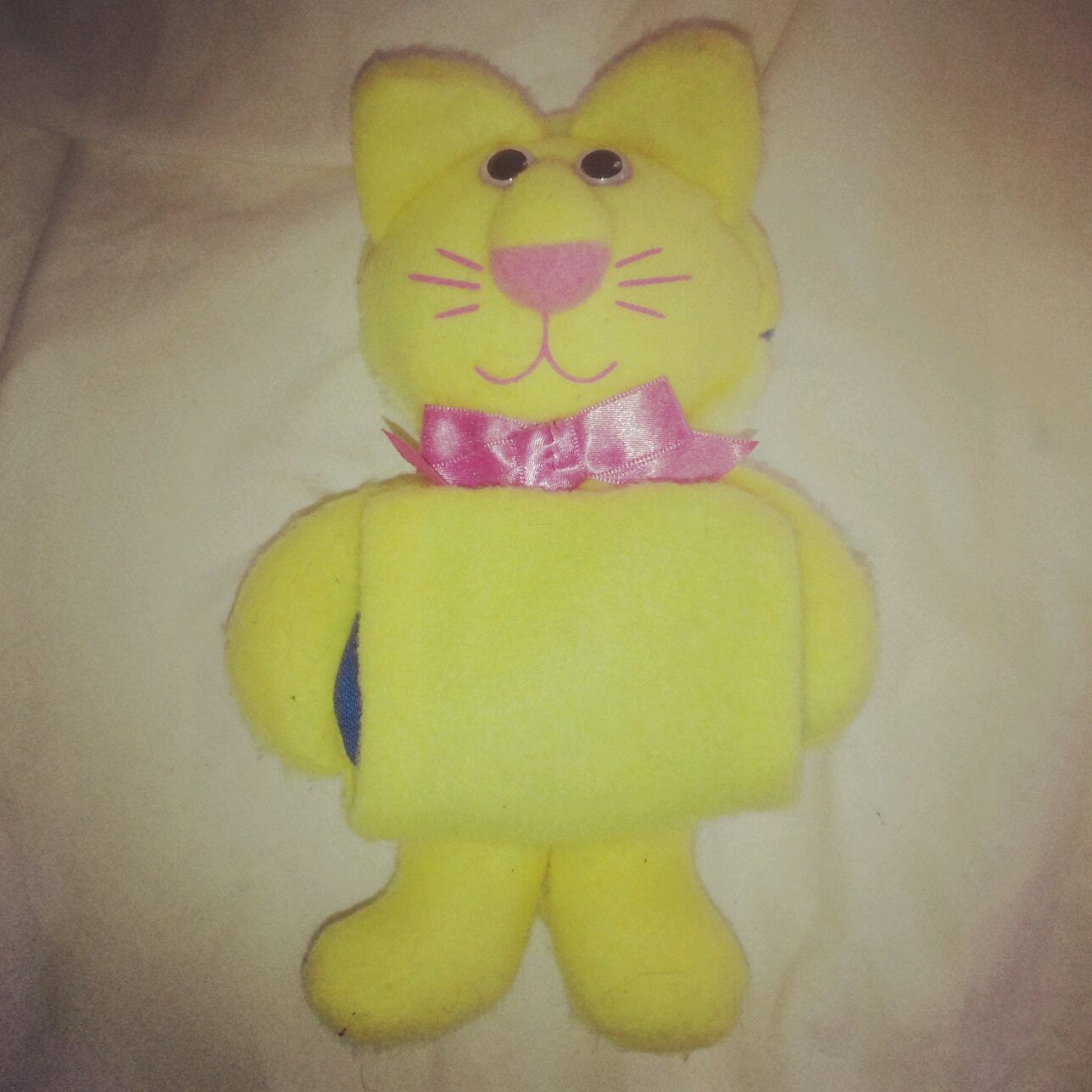 stuffed yellow cat