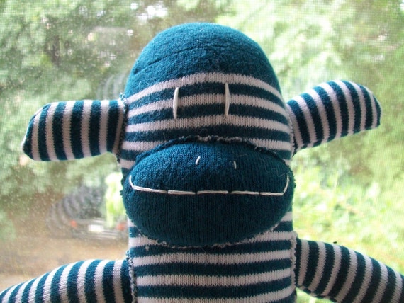 red and white striped sock monkey