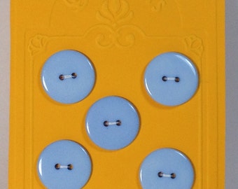 5 Buttons resin 22mm 2 holes light blue.