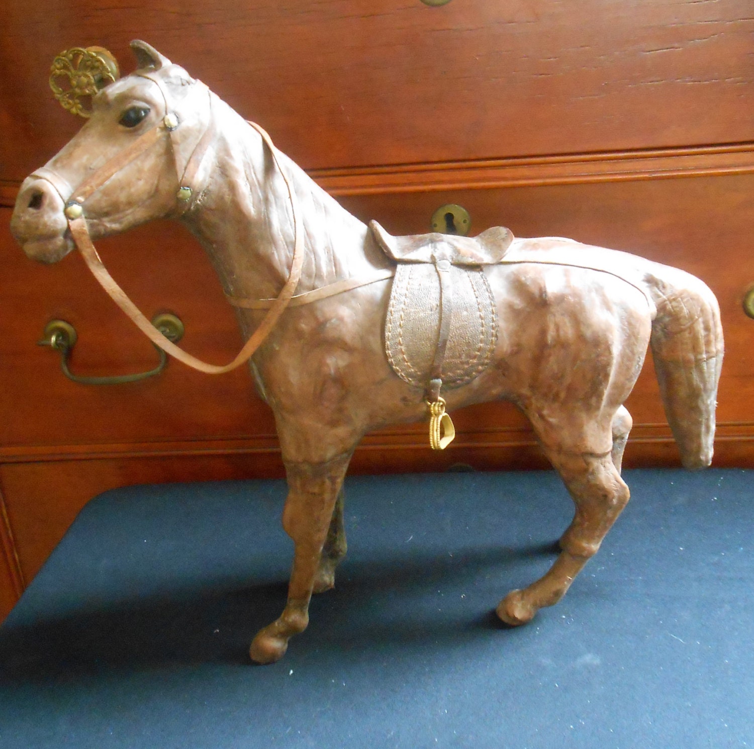 antique leather horse figurine