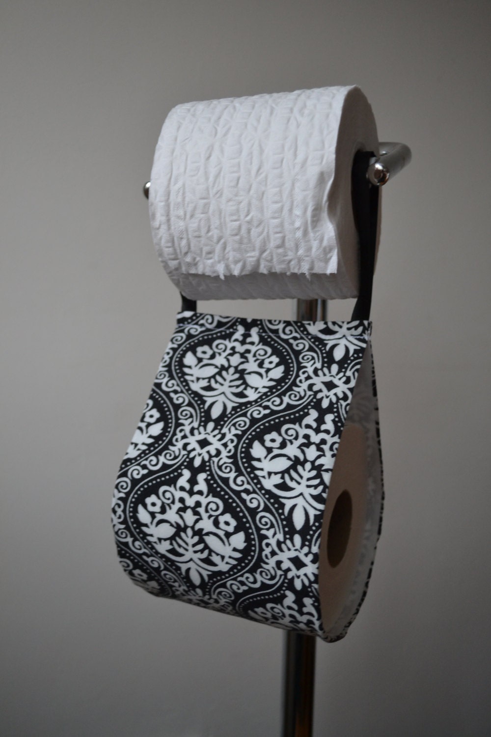 The decorative toilet paper holder storage with fabric black