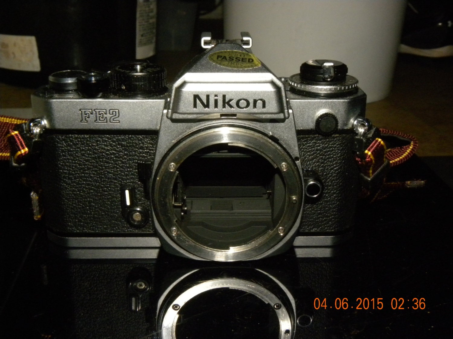 Vintage Nikon FE2 35mm camera with 3 nikon nikkor lenses & accessories