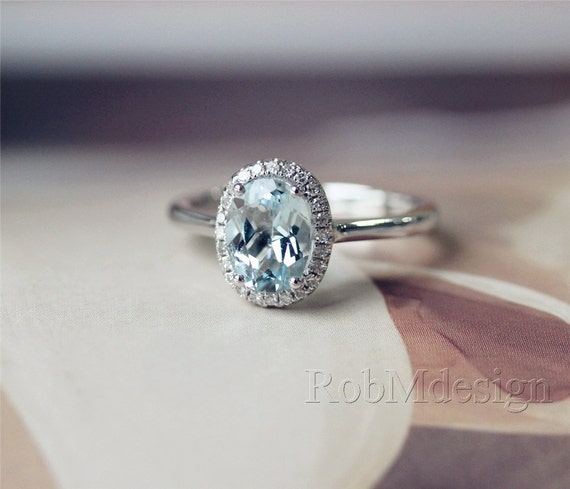 Round cut aquamarine engagement rings