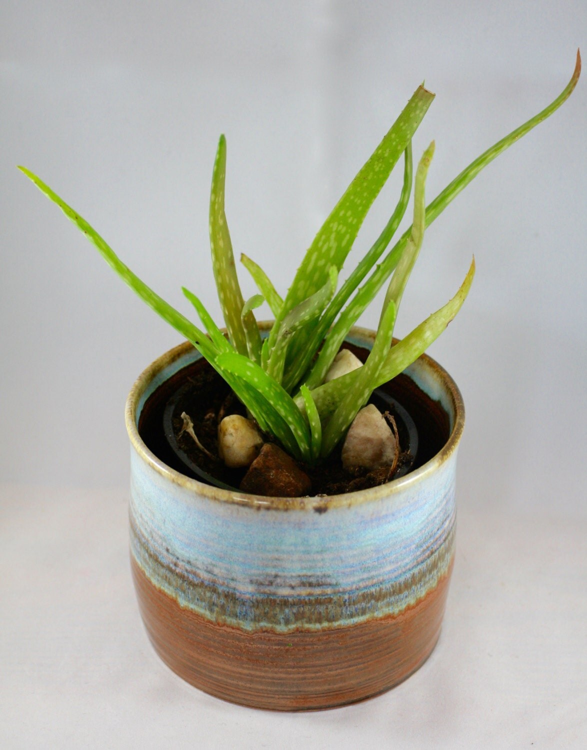 Stoneware pottery planter/ cache pot copper and light blue
