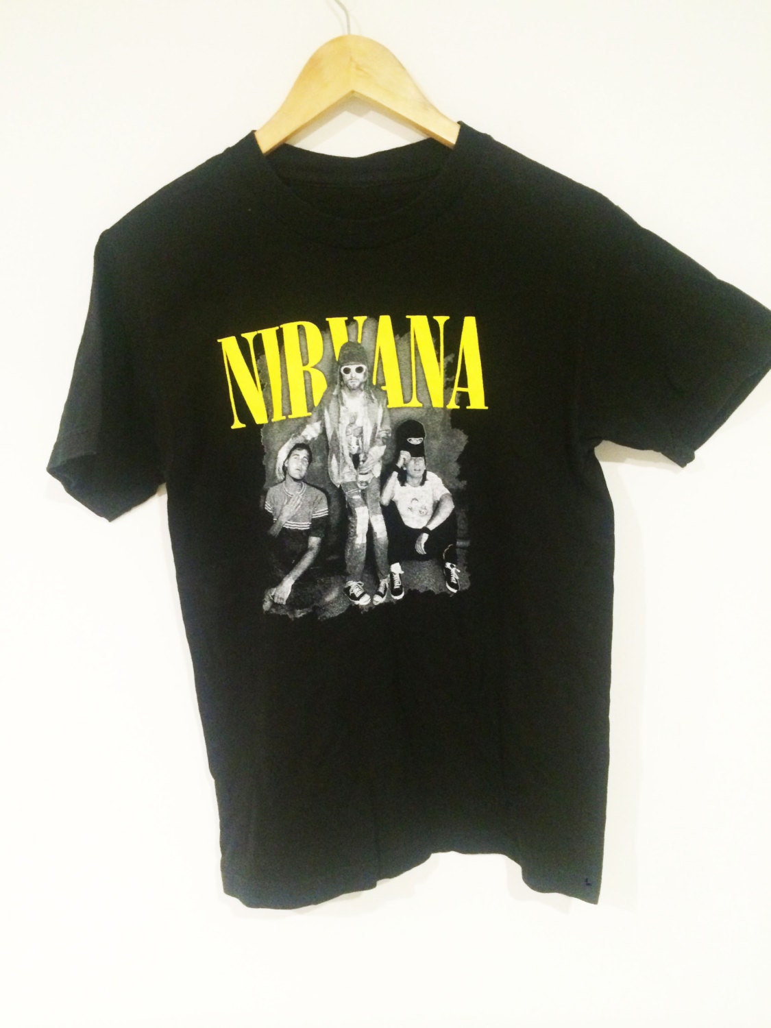 Vintage Nirvana Shirt
 Vintage Nirvana band t shirt by PLANETCARAVAN01 on Etsy