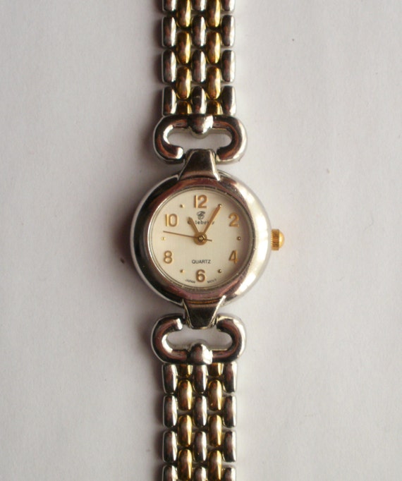 Celebrity Wrist Watch. Ladies' Quartz Watch. Dual Tone Gold and Silver ...