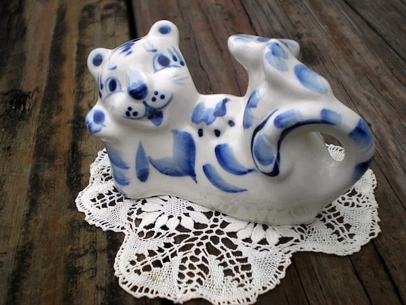 blue ceramic cat figurine