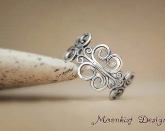 open filigree wedding rings