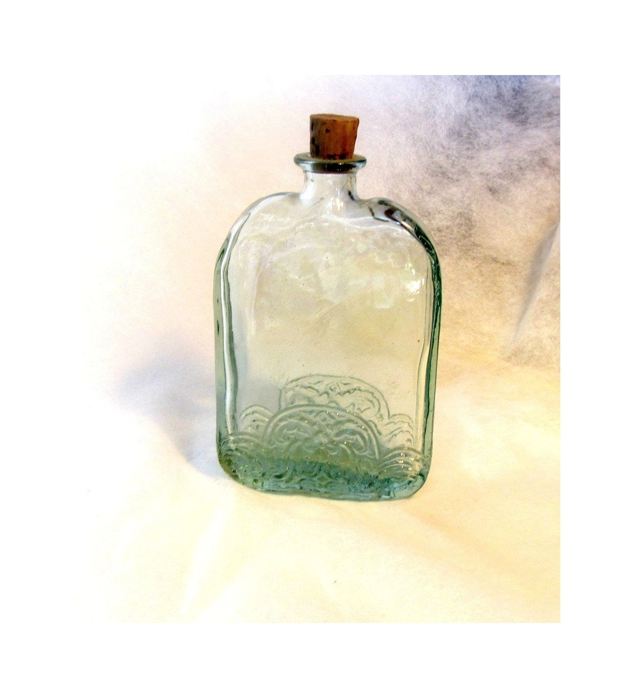 Clear glass bottle with cork. Decorative clear glass bottle.