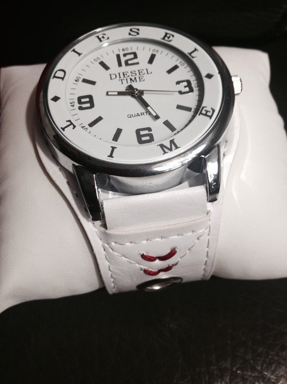 Men's large white faced watch with baseball seams stitched into the ...