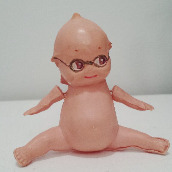 Vintage Celluloid Kewpie doll sitting with by DanushasCollectibles