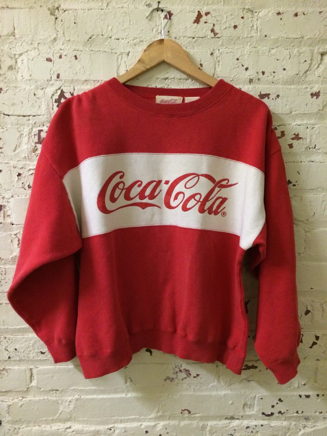 blue coca cola sweatshirt