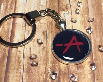 PRETTY LITTLE LIARS -A keychain keyring, pll keyring
