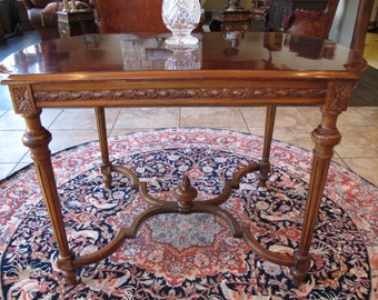 Louis XVI Style Carved Mahogany Center Table with Flame Finial
