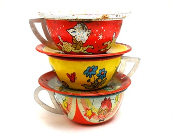 50s Tin Toy Tea Cups & Saucers, Set of 6 with puppy, lamb and pelican.