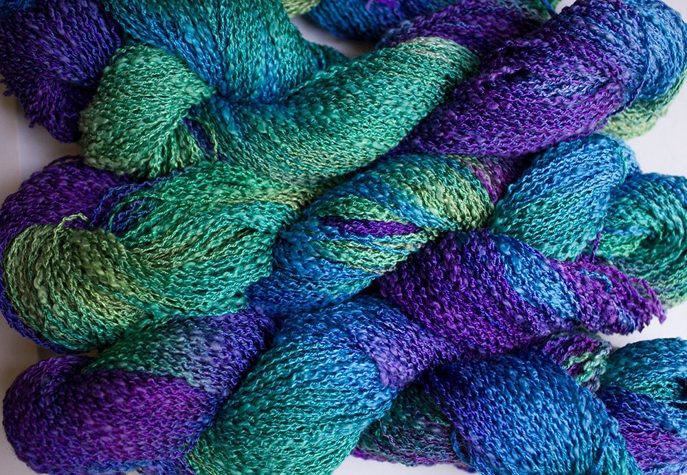 All Listings Cotton Rayon Boucle Yarn| A. This mostly cotton boucle yarn is excellent for weaving. You could knit with it, too, to add a bit of texture to your projects. Who doesn’t love a little boucle now and then!? Contents: 83% cotton, 17% rayon. YPP: 1, yards per pound.