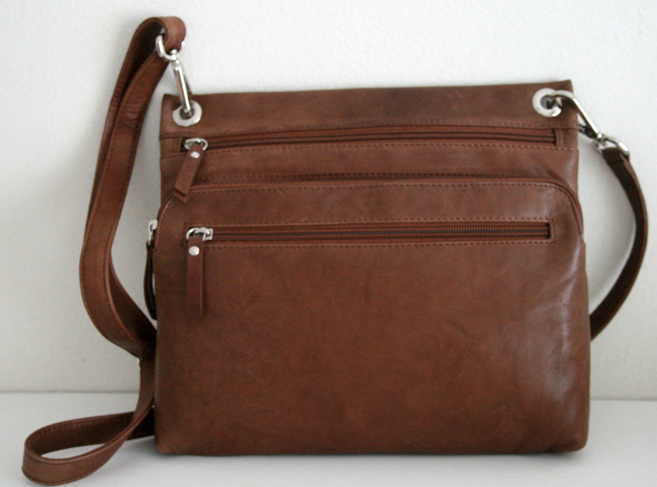 flat leather crossbody bag