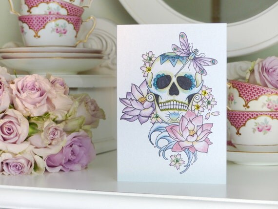 sugar skull lotus flower and dragonfly day of the dead tattoo
