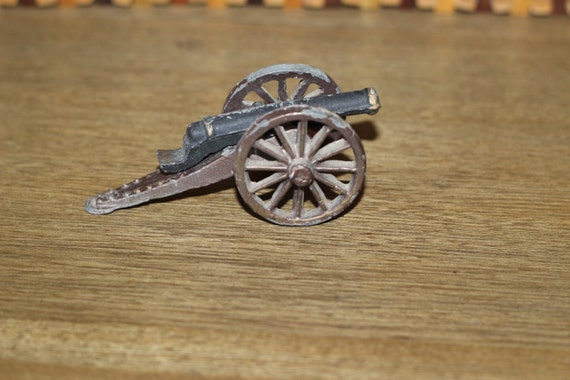 Vintage Cast Iron Mini Toy Cannon by ShopNothingOrdinary on Etsy