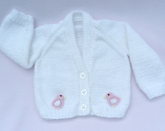 Baby sweater. Hand knitted white cardigan to fit 0-3 months