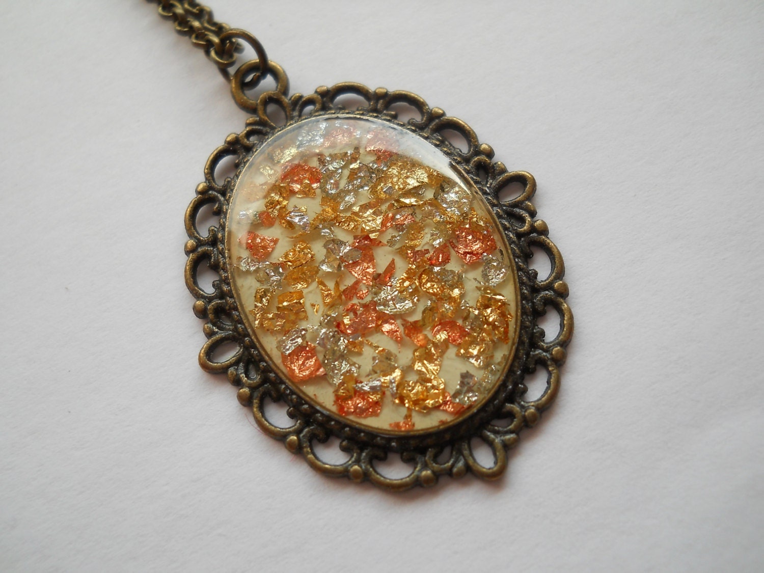 Metallic flakes oval pendant gold flakes jewelry by LightPurple