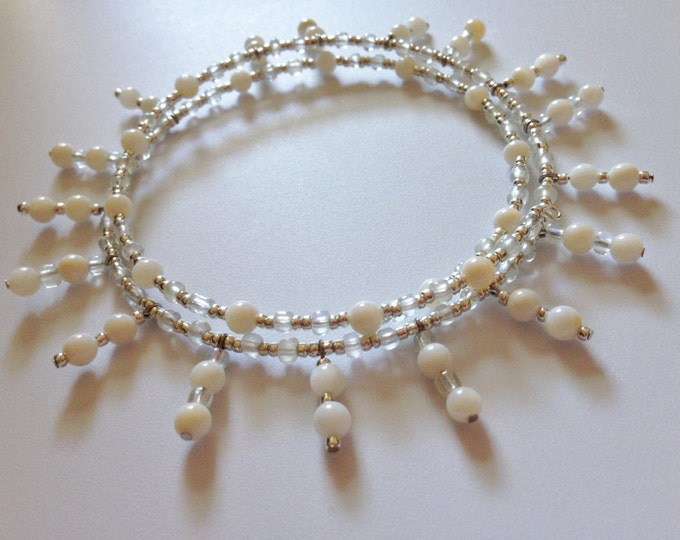 white shell with silver and clear glass bead memory wire necklace