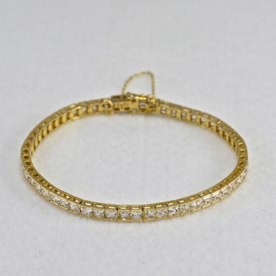 14K Gold Tennis Bracelet With Princess Cut by MandMjewelersBoise