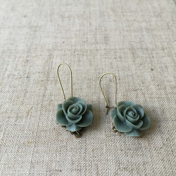 Items similar to Bronze drop earrings with pretty grey flowers. on Etsy