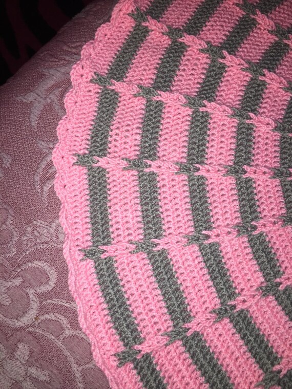 Round Pink and Grey Jacob's Ladder Baby Afghan