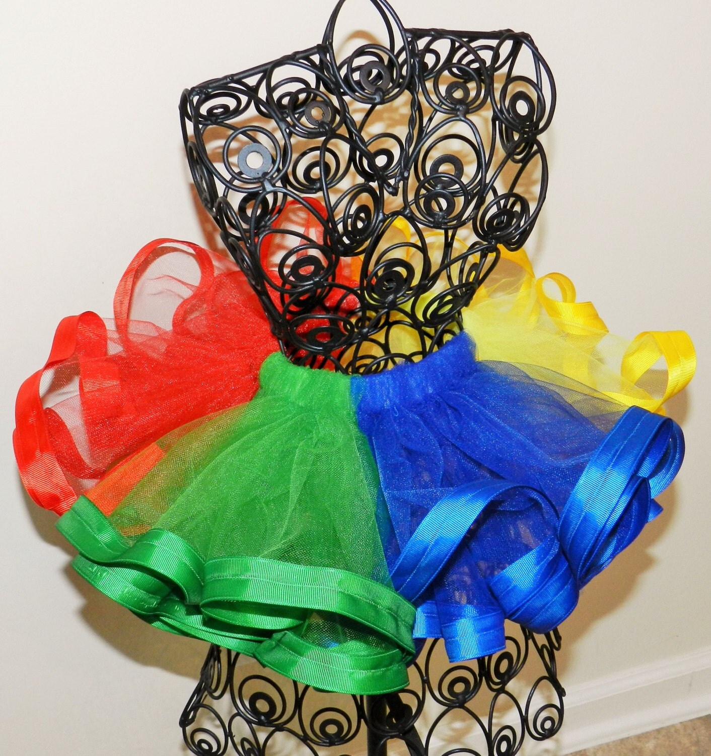 Four Colored Tutu with ribbon trim. blue red green yellow
