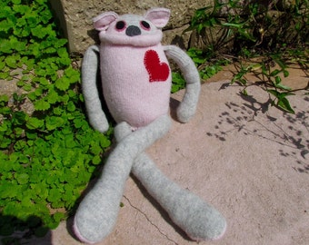Handmade repurposed sweater monster. Stuffed monster.