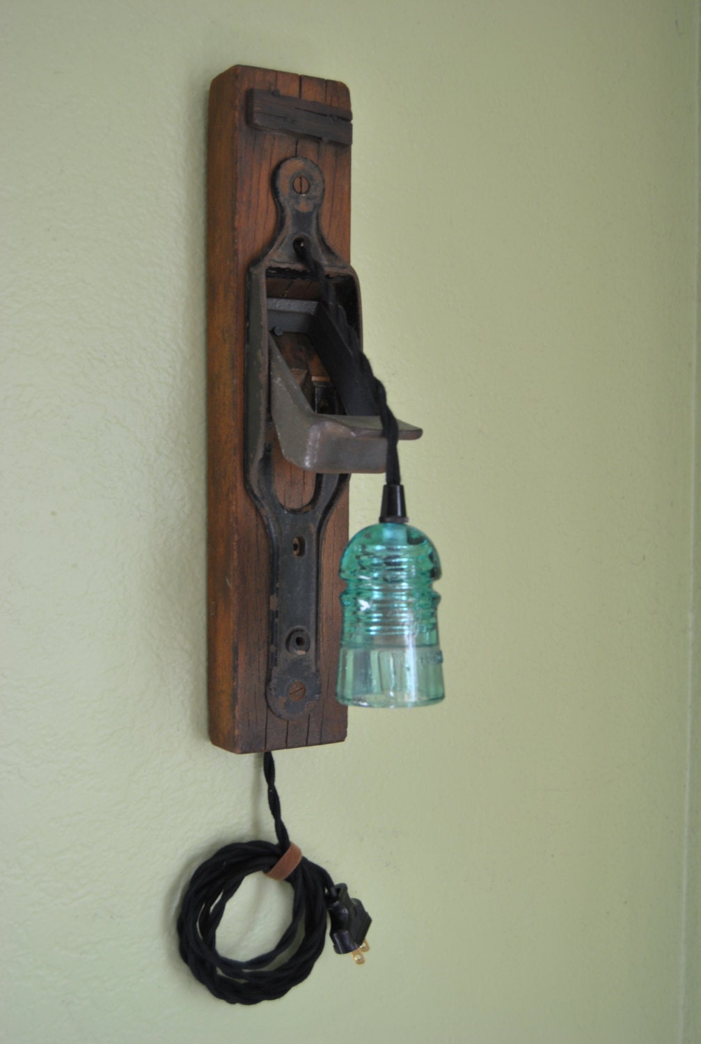 Wooden hand plane glass insulator wall-mounted light