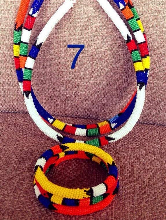 A set of 3 Zulu beaded necklaces and bangles.