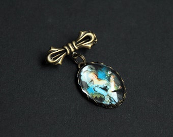 Broche Marie-Antoinette : médaillon noeud victorien portrait reine France