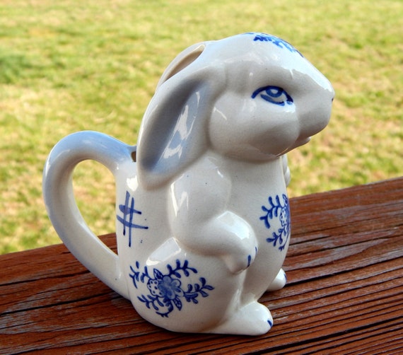 blue and white rabbit figurines