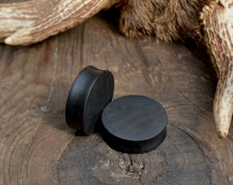 33 mm ear plugs, 1" 5/16 ear plugs, 1" 3/8 ear plugs, ebony ear plugs, huge ear plugs, 1" 3/8 ebony ear plugs, black ear plugs, ebony plugs