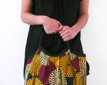 Sac baluchon en tissu coton Wax mot if cible ... Sac baluchon en tissu coton Wax mot if cible ...