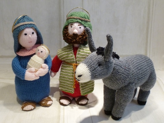 25cm four piece hand knitted nativity set. Mary Joseph baby