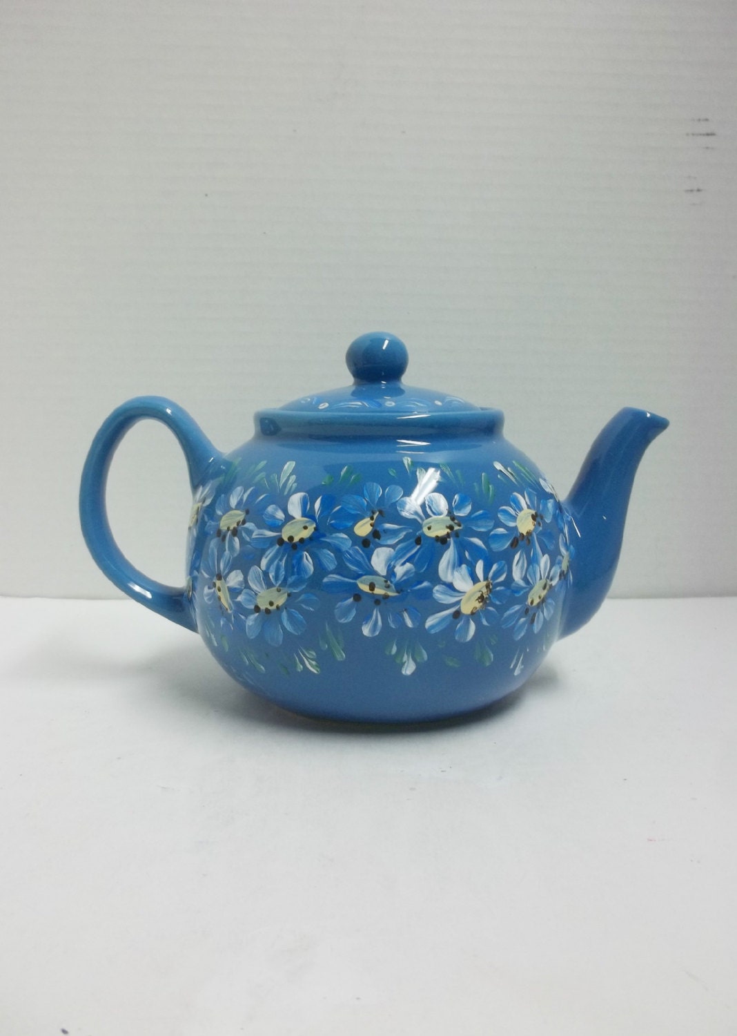 blue ceramic teapot