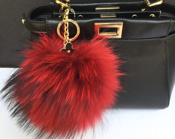 Red Raccoon Fur Pom Pom luxury bag pendant + black flower clover charm keychain