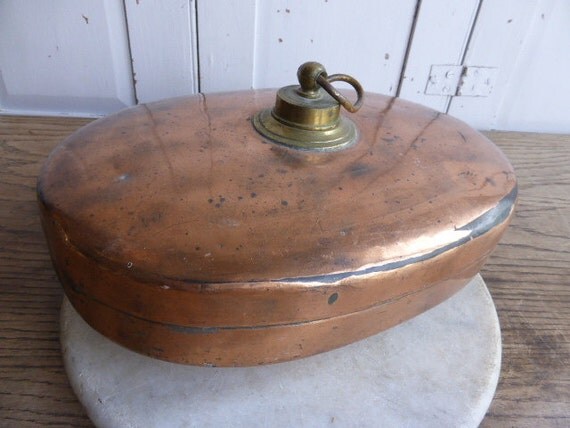 Antique Victorian copper water bottle with brass lid and