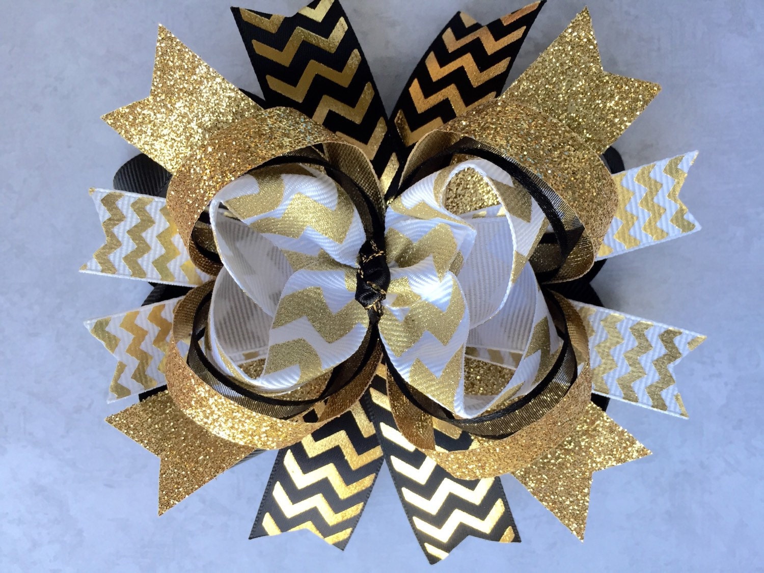 Black and gold hair bowgold black white hair bowblack white