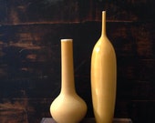 Ships  Now-  2 large vases in 2 shades of Ochre.