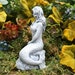 large concrete mermaid statue