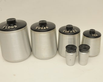 Kromex Canister Set with Salt and Pepper Shakers