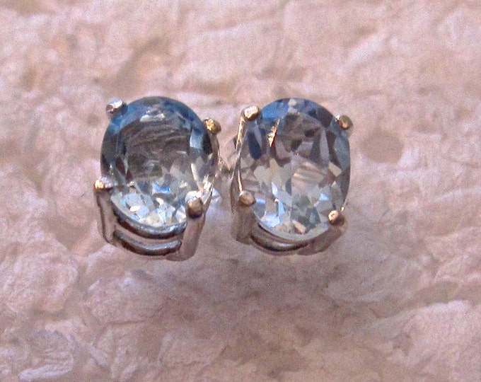 Sky Blue Topaz Studs,8x6mm Oval, Natural, Set in Sterling Silver E813