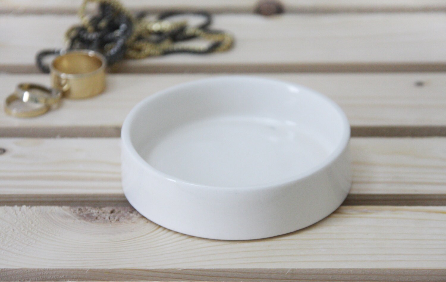 Ceramic jewelry dish in white and clear glossy glaze. Ring