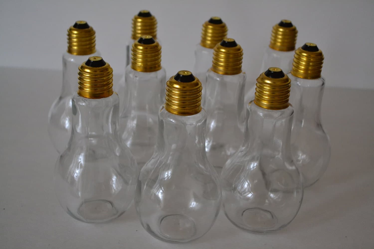 Medium Light Bulb Shaped Glass Bottle Brass by TsEclecticCorner