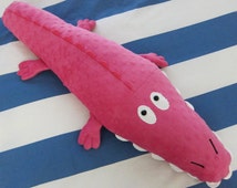 pink stuffed alligator