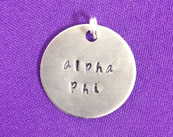 Handstamped Sorority Greek Alpha Phi charm made of non-tarnish aluminum, officially licensed